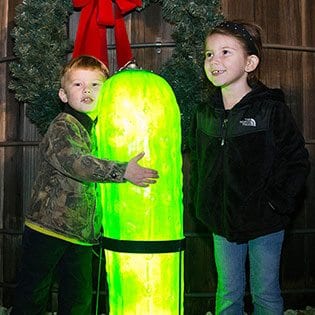 Children with a pickle light