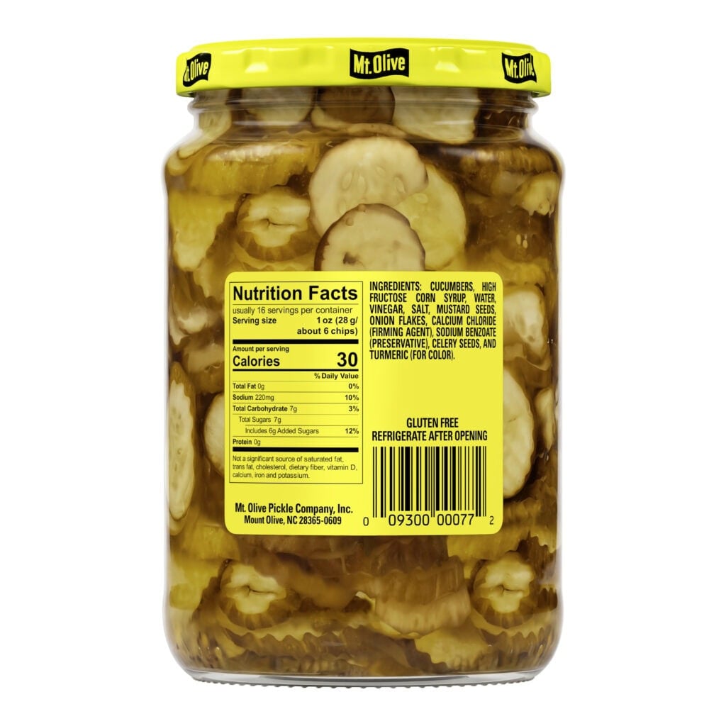 Jar of Mt Olive bread and butter pickle chips with label details.