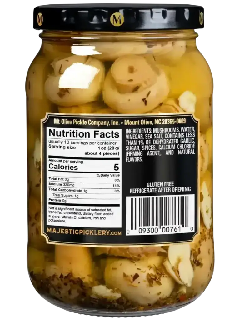 Jar of Mt Olive seasoned pickled mushrooms with herbs and spices.