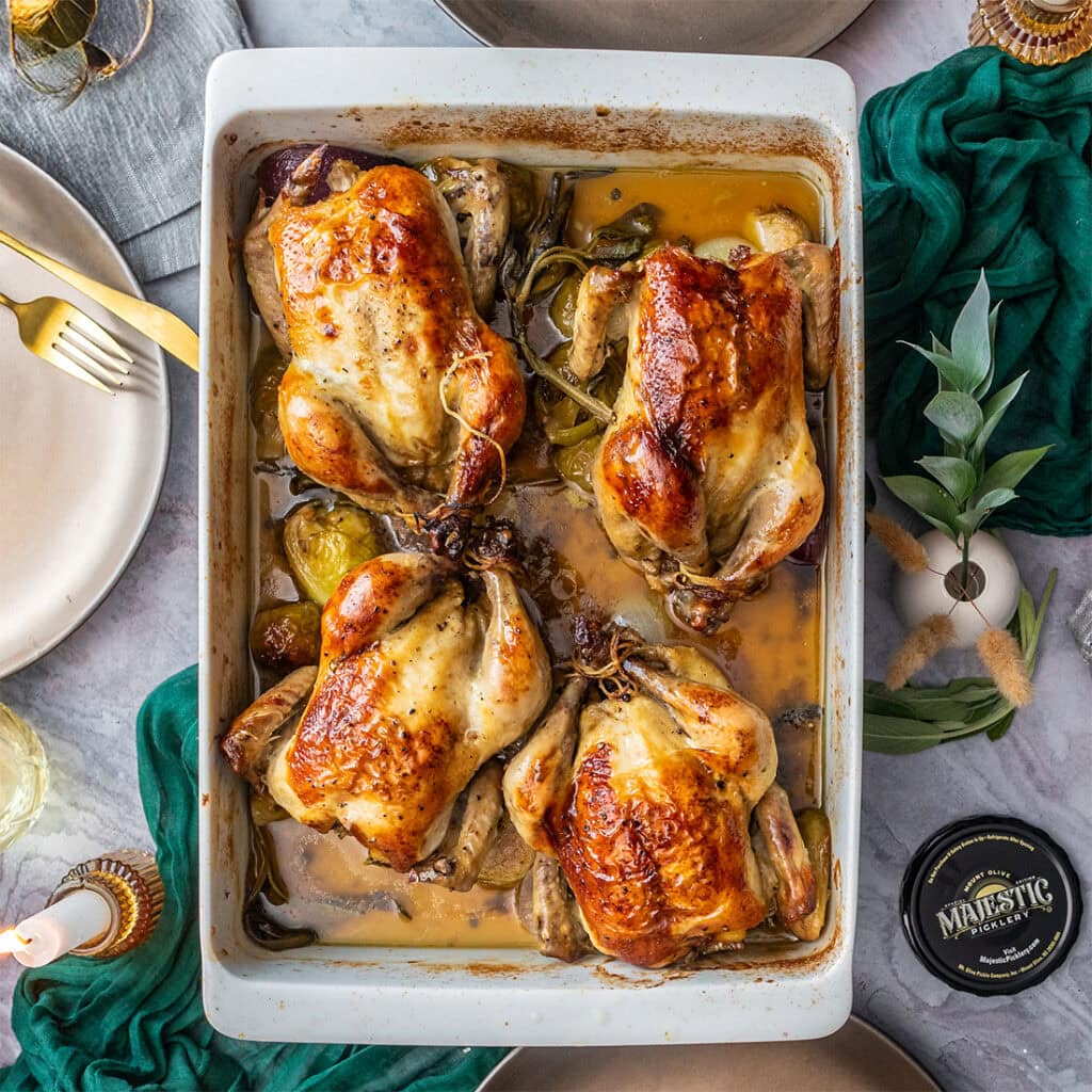 Dish with brussels sprouts and cornish hens, roasted in juice