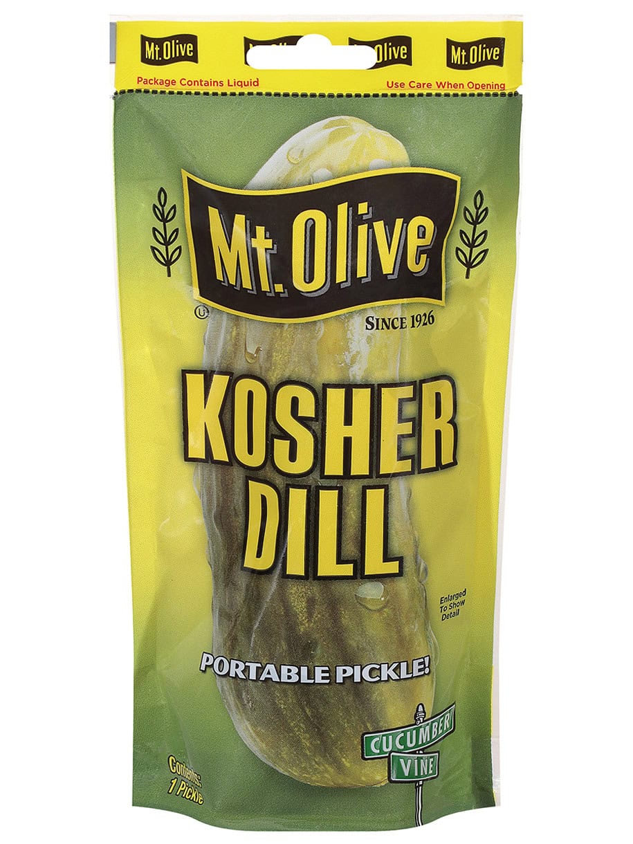 A pouch holding a Mt. Olive Single Serve Kosher Dill Portable Pickle.