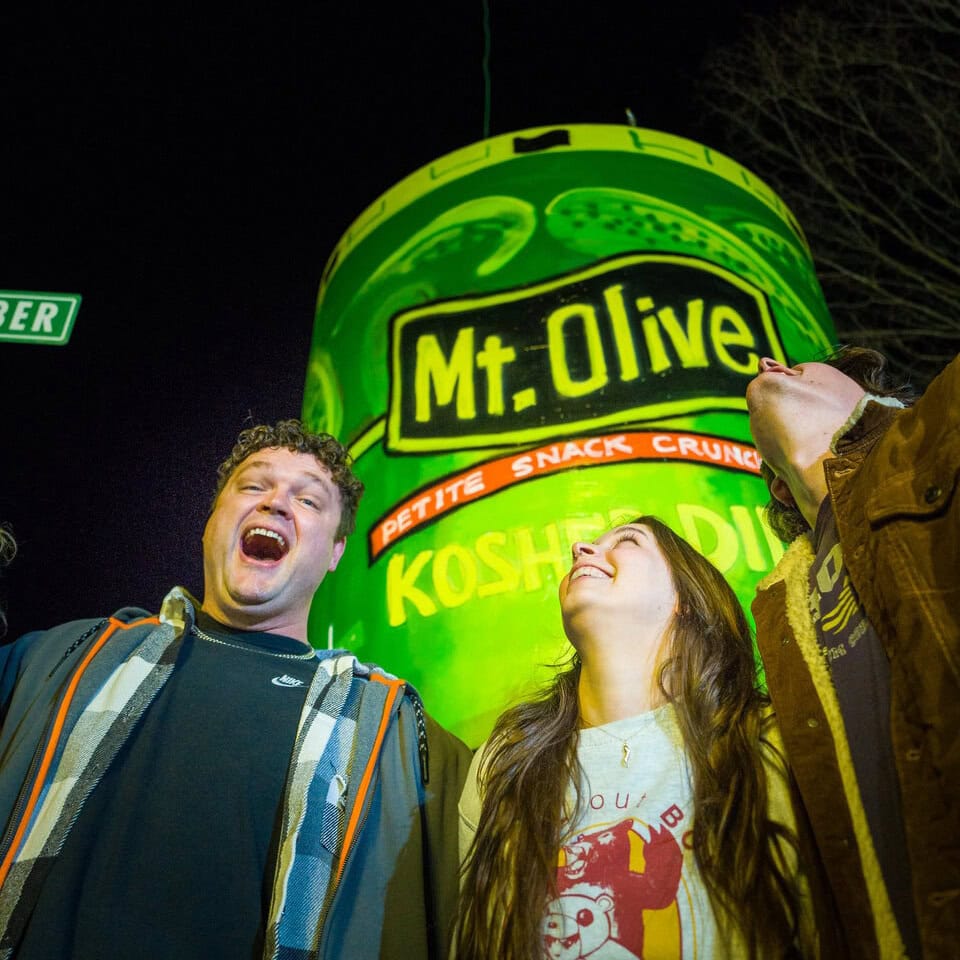 People enjoying the 2025 Pickle Drop event at Mt. Olive Pickles.