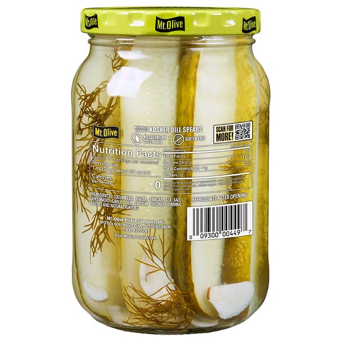 The back of a Mt. Olive Pickles kosher dill spears jar showing nutritional facts and ingredients.